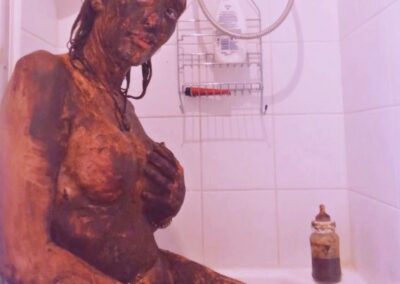 Pornstar Nalina "Scat" Wonders in a mystique inspired look. Smearing her body with poop.