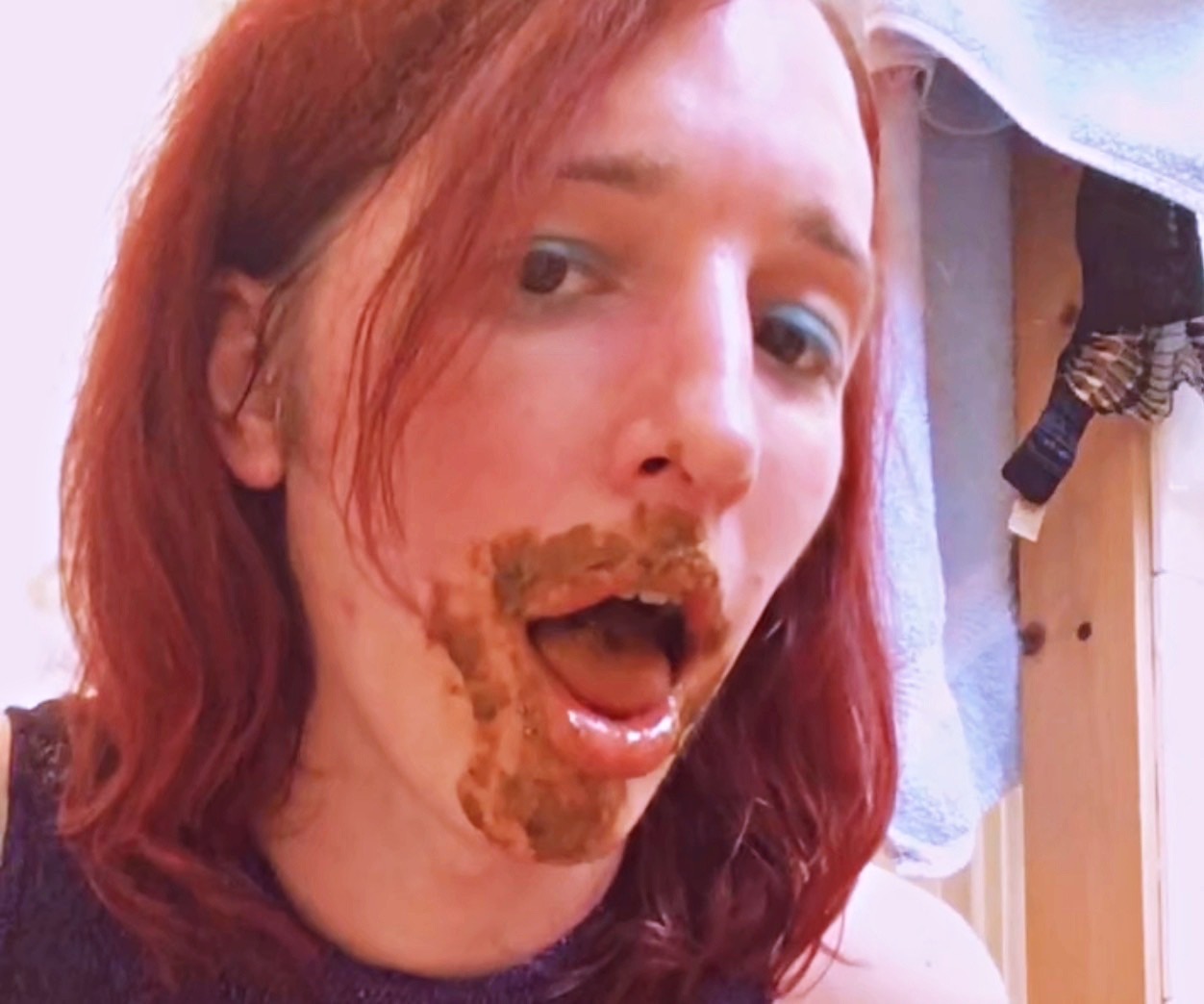 photography of scat model Nalina Wonders with poop all over her mouth 