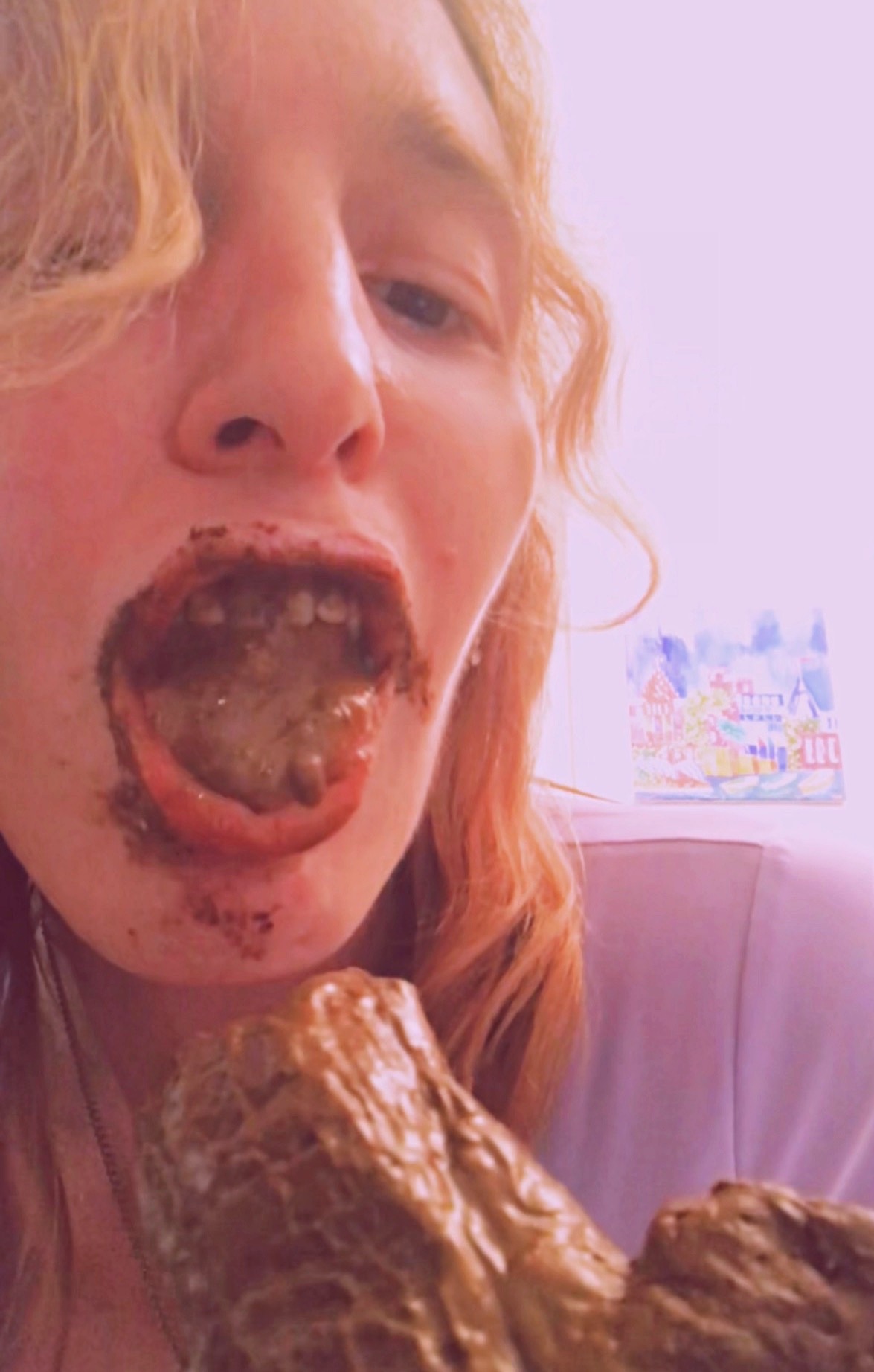 photography of scat porn model Nalina Wonders with poop in and all over her mouth.