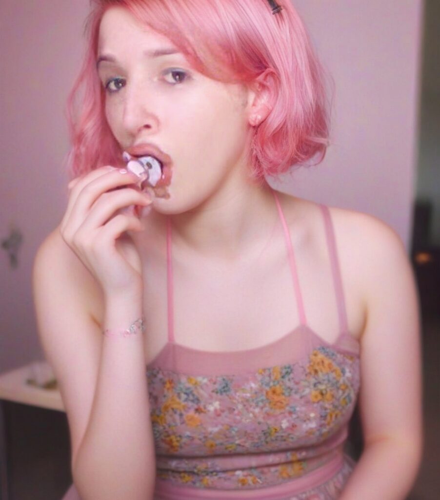 Watch Nalina Wonders dressed as a sissy girl with a nice casual floral top enjoying her chocolate on a pacifier